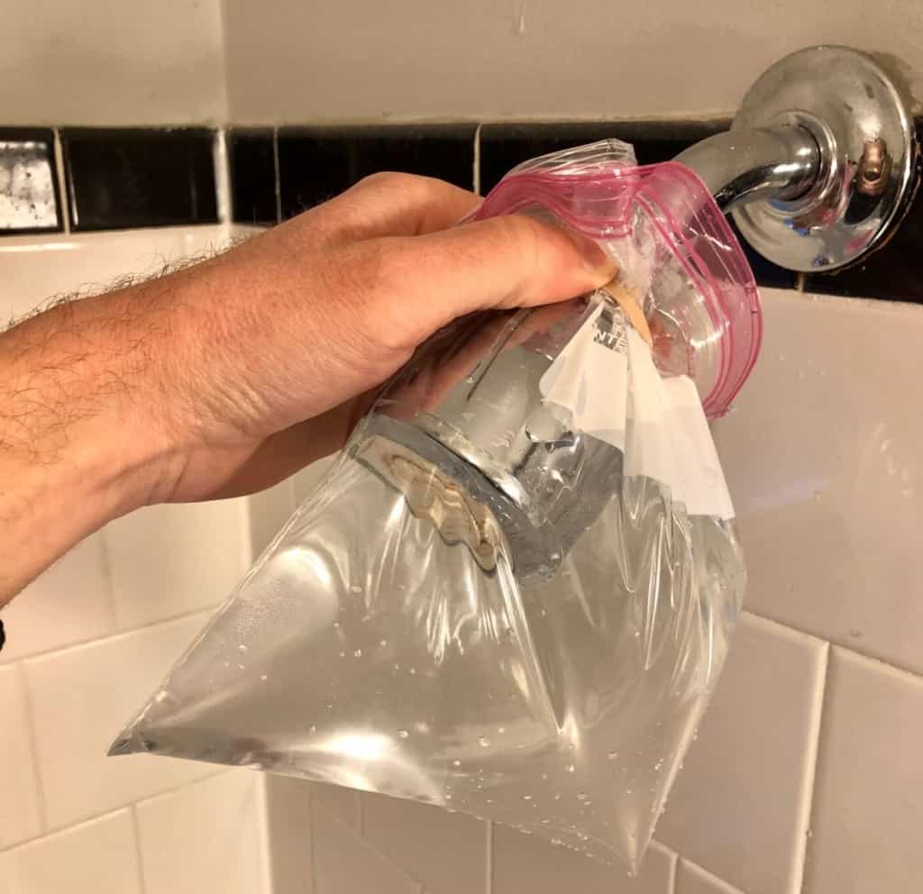 how to clean a shower head