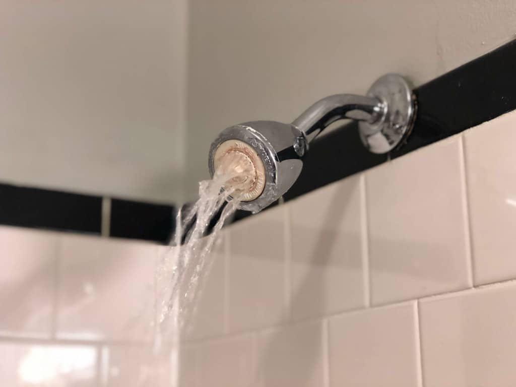Water not coming out of shower head properly
