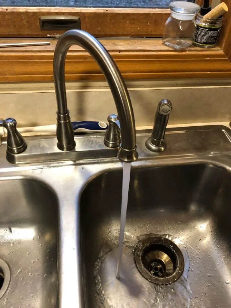 Cleaning a dirty faucet head