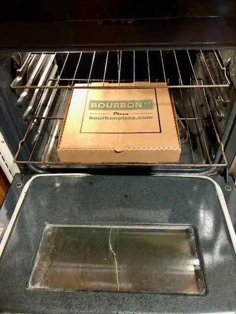 can you put a take out pizza box in an oven